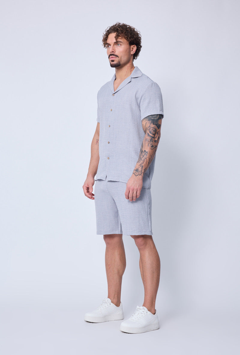 Ensemble rio gris de la marque NO LIMIT, vêtement confortable avec pantalon et haut assortis, porté par un mannequin.
