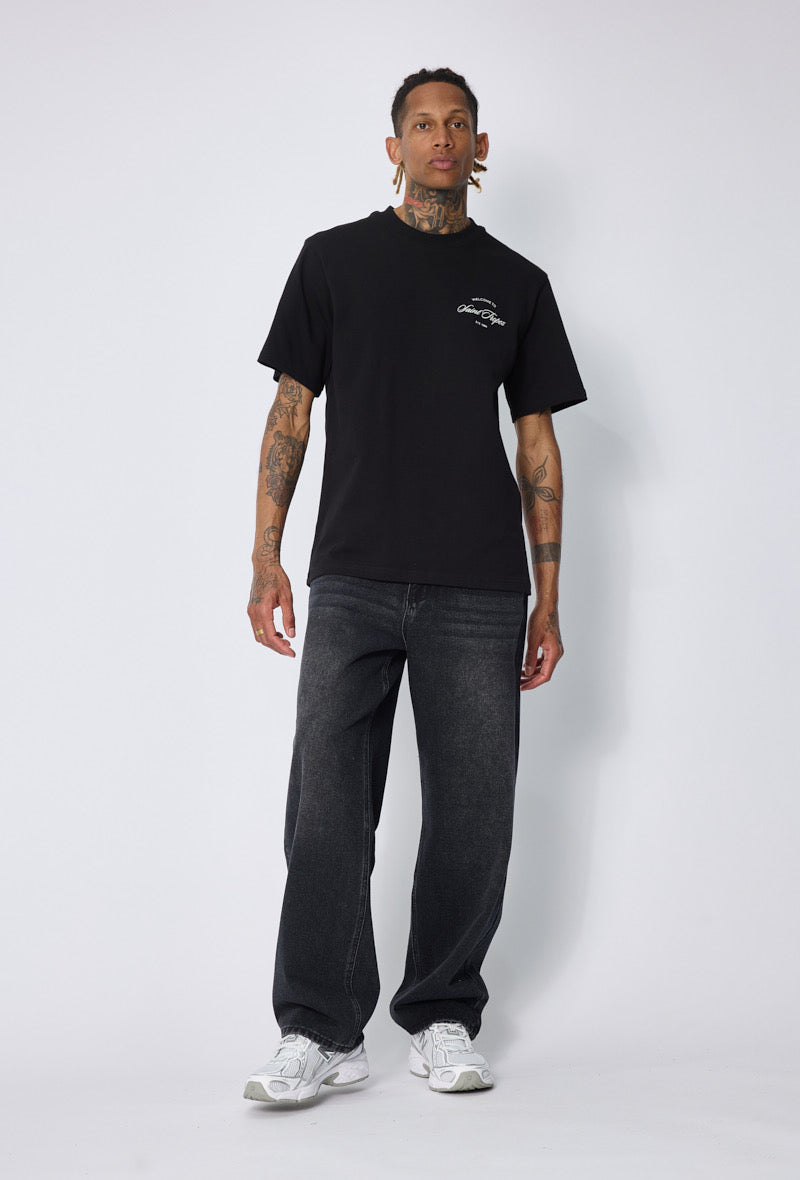 T-shirt noir Saint Tropez de la marque NO LIMIT, vue en gros plan montrant le tissu et le design simple.