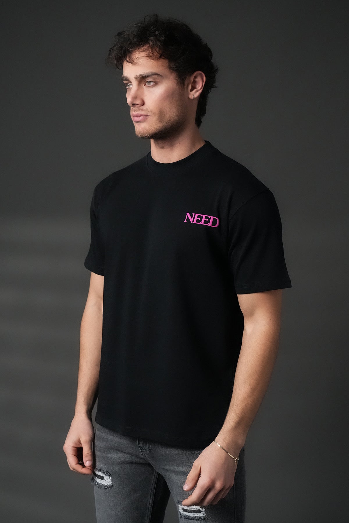 T-shirt noir Need de la marque NO LIMIT, tissu doux, coupe classique, affichant un design simple sur le devant.