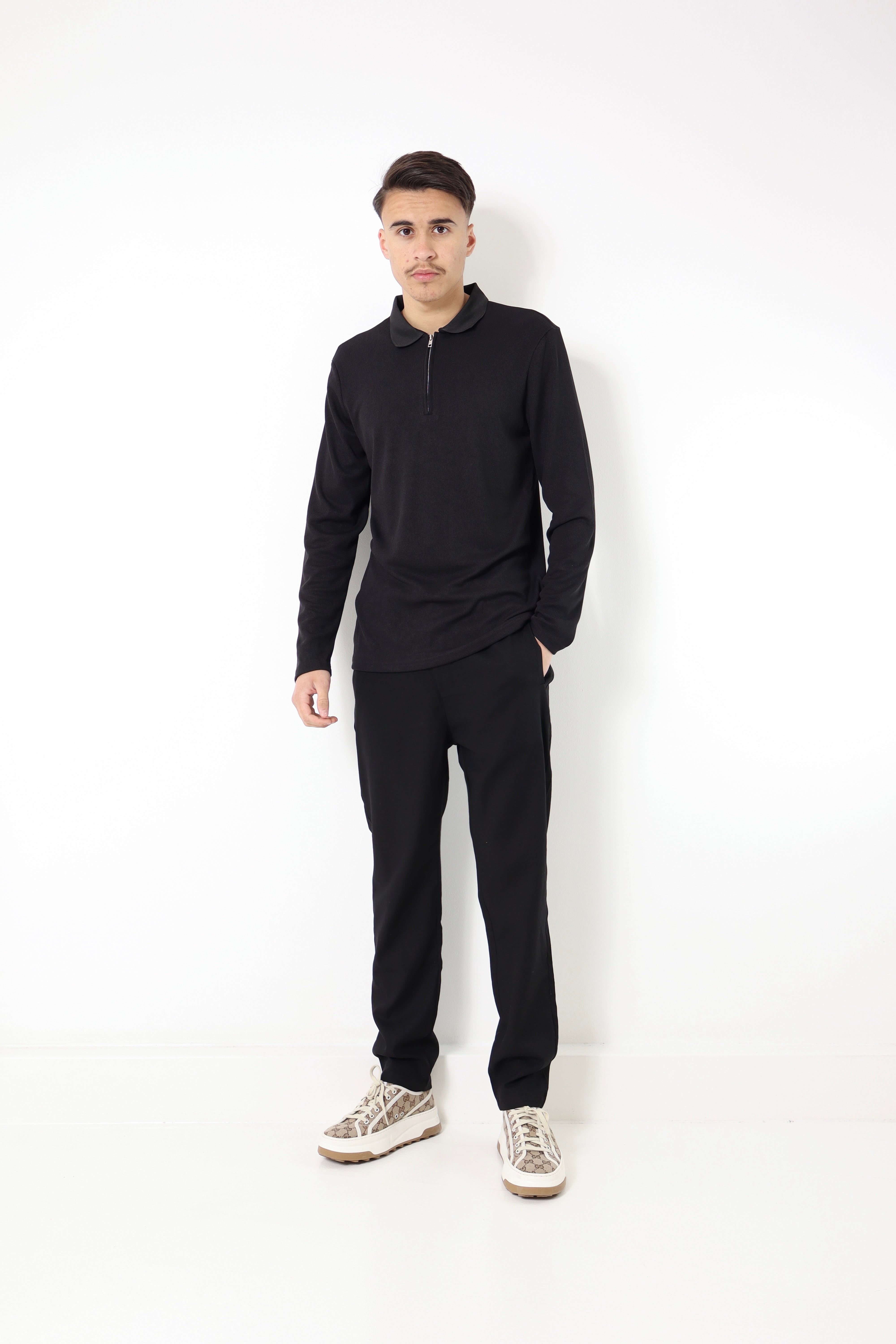 polo manches longues - à zip - noir