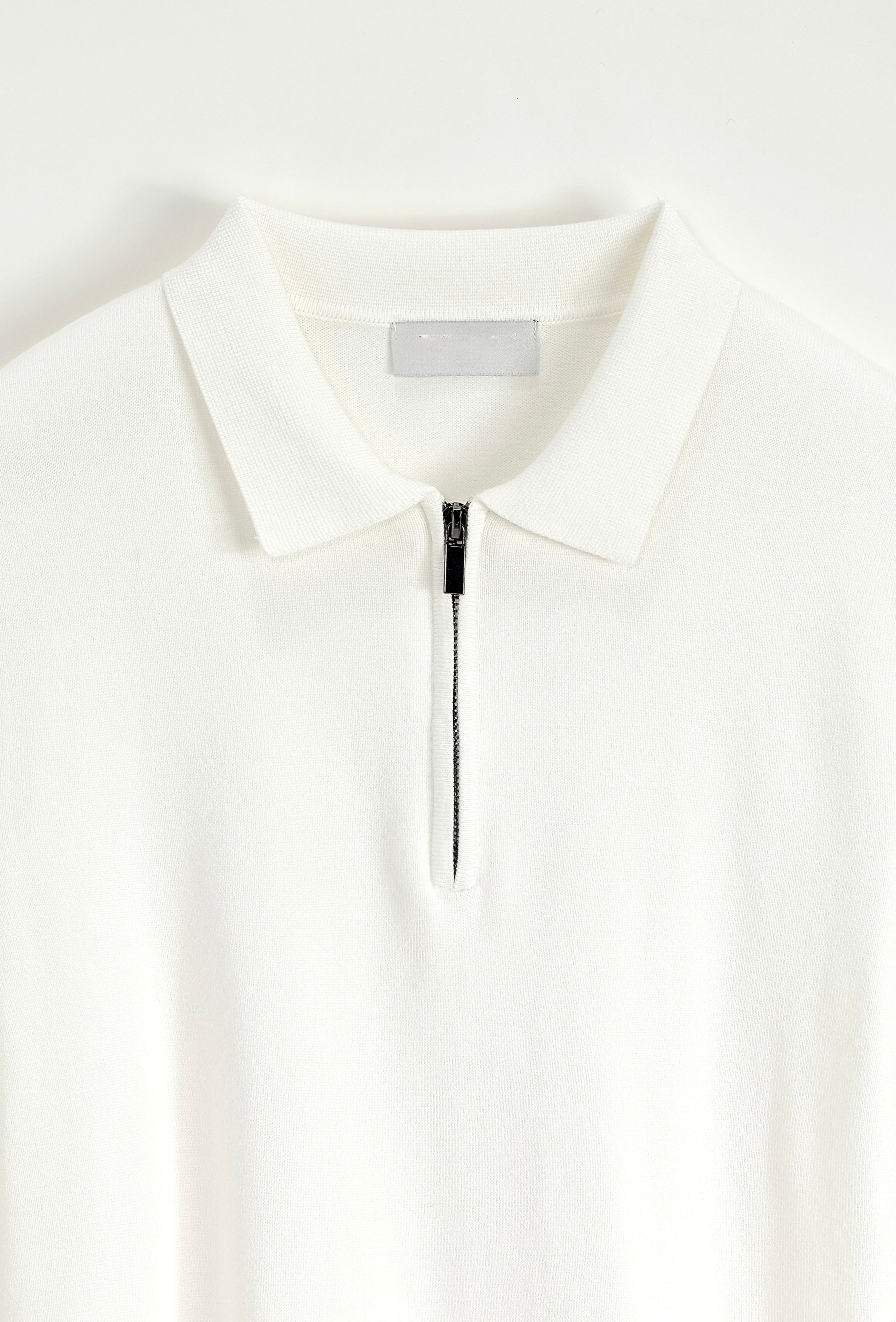 Polo col à zip blanc NO LIMIT à manches courtes, vue de face, en tissu léger et confortable.
