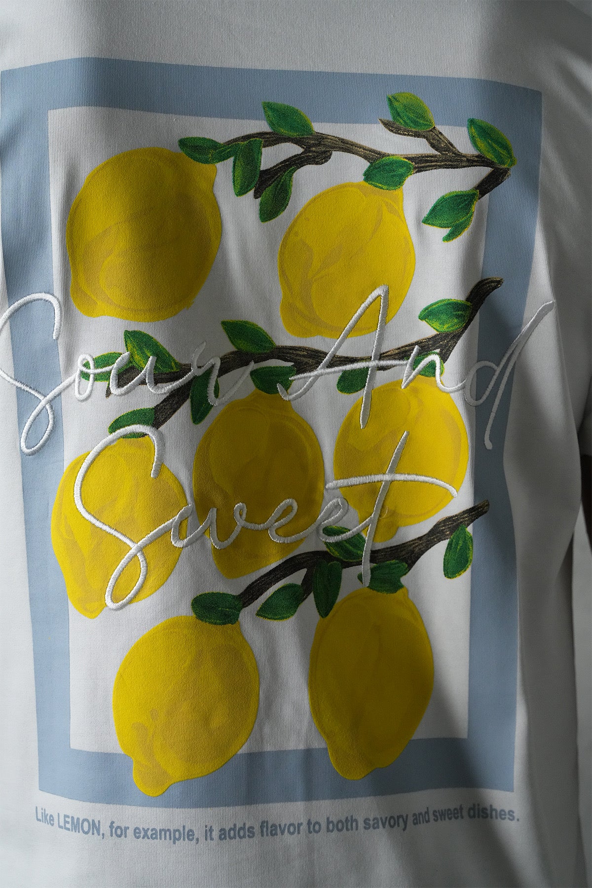 T-shirt blanc NO LIMIT avec motif citron jaune sur le devant, tissu léger et confortable, style décontracté.