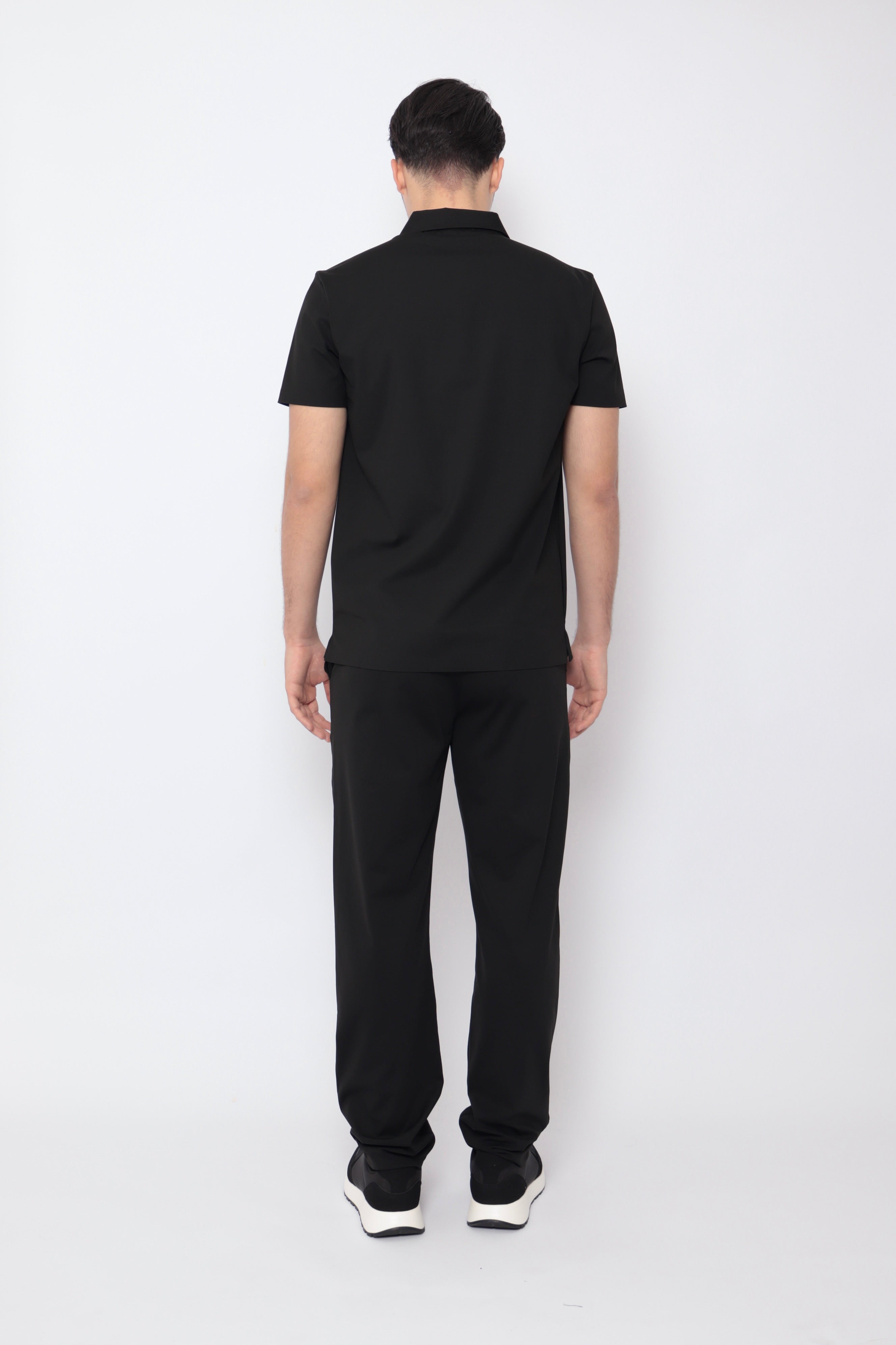 Ensemble Monaco noir de la marque NO LIMIT, comprenant un haut et un pantalon, porté sur un mannequin.