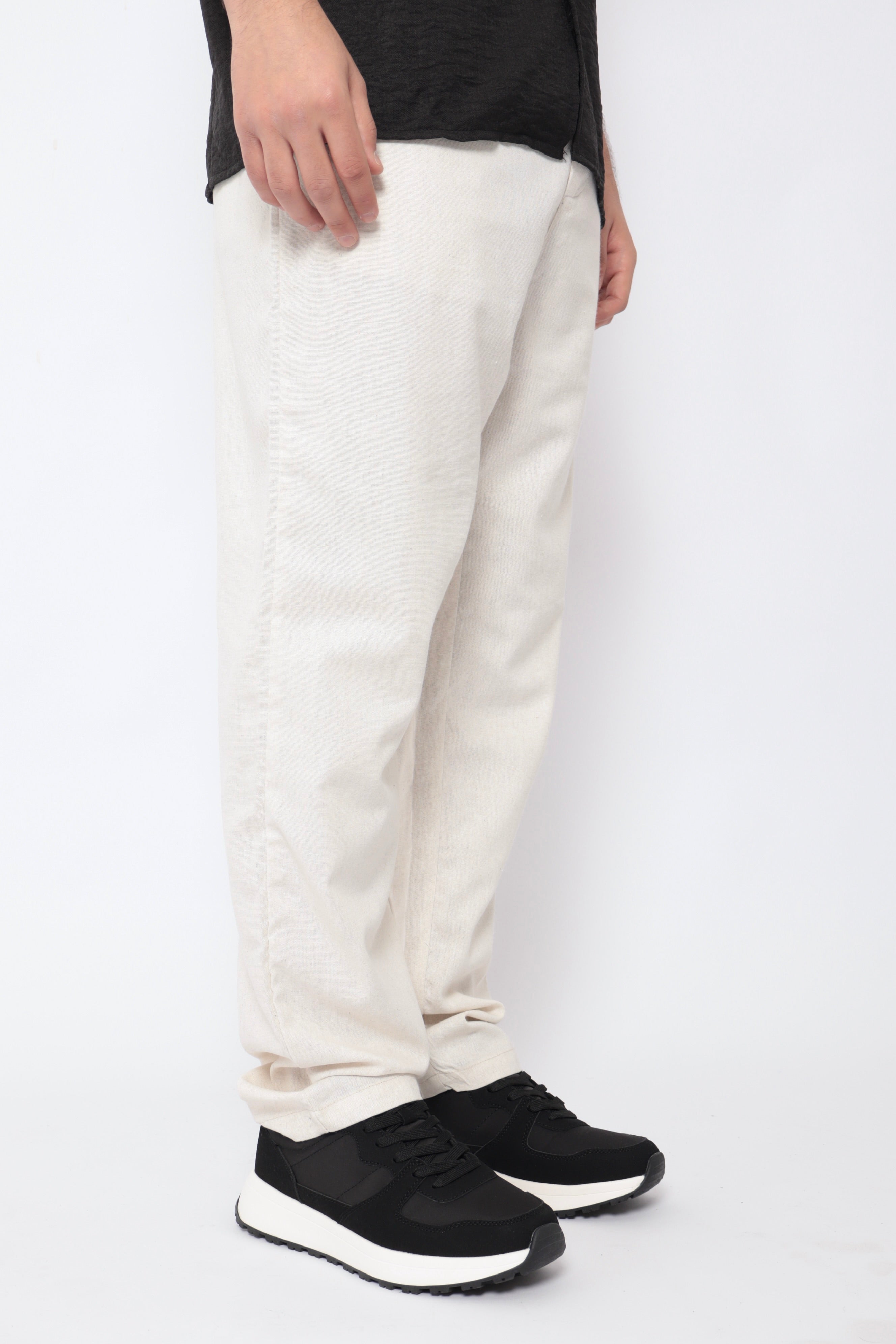 Pantalon beige effet lin NO LIMIT porté, vue de face, tissu léger et confortable pour un style décontracté.