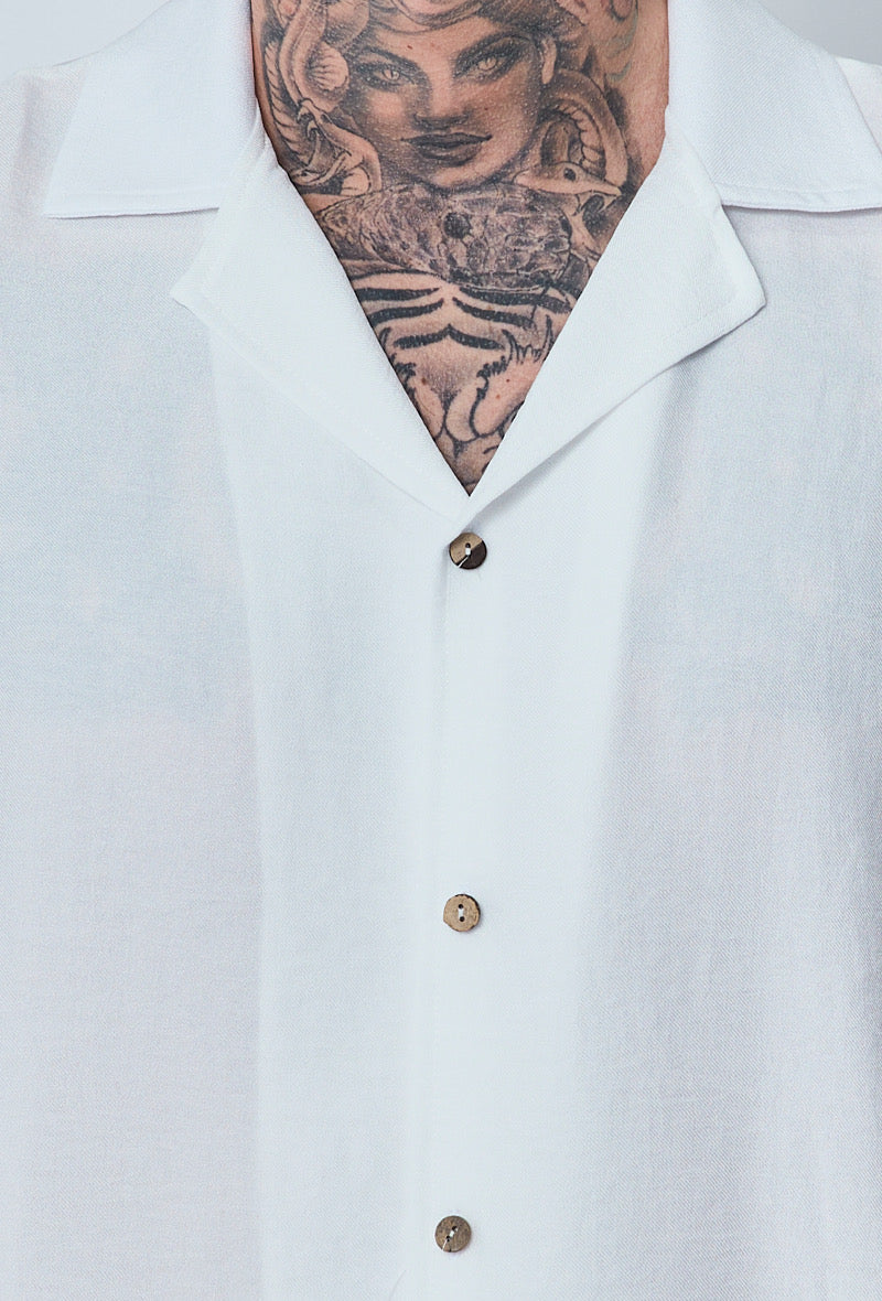 Chemise légère blanche NO LIMIT avec col et manches longues, vue de face sur un fond neutre.