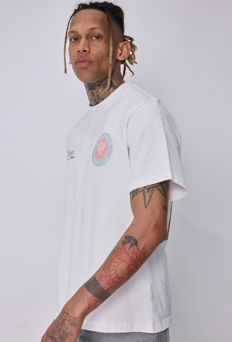 T-shirt blanc NO LIMIT Beverly Hills avec logo imprimé, porté sur un mannequin, vue de face.