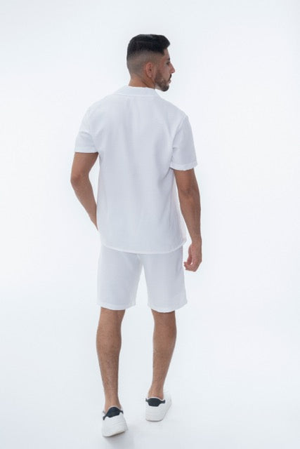 Ensemble rio blanc de la marque NO LIMIT, vêtement confortable avec top et pantalon assortis, porté en style décontracté.