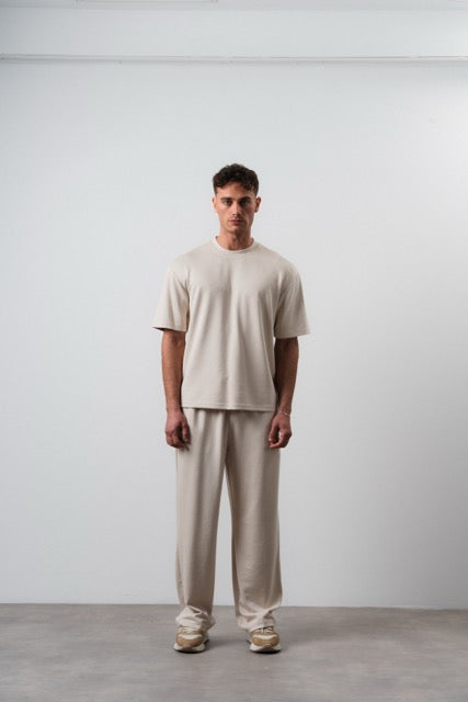 Ensemble lyon beige de la marque NO LIMIT, comprenant un haut et un pantalon, porté par un mannequin.