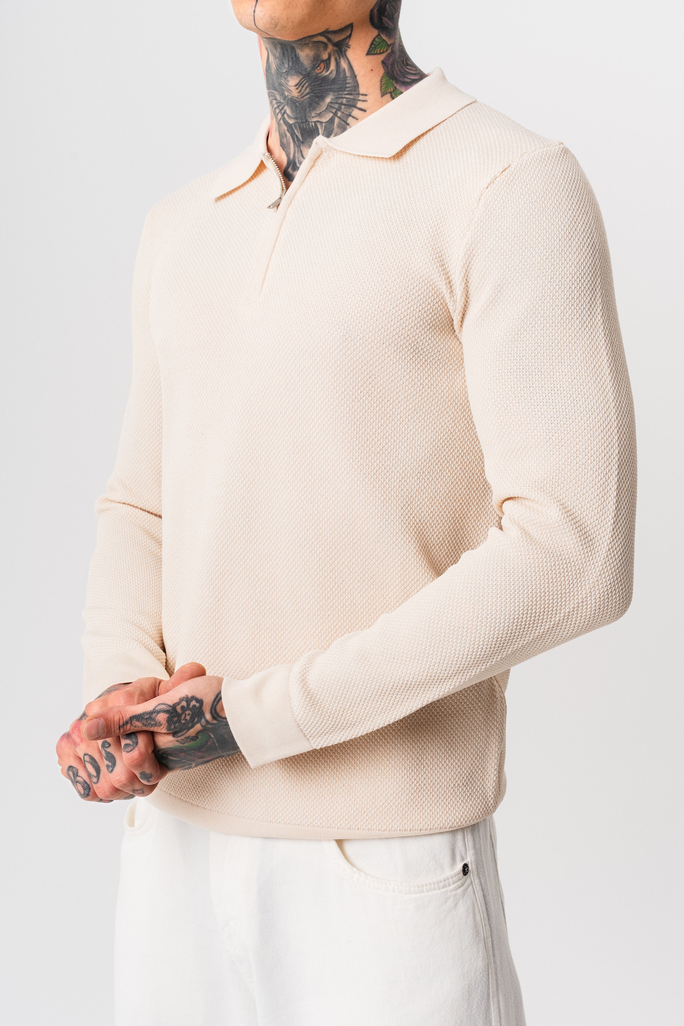 Polo texturé à zip beige pour homme, manches longues, marque NO LIMIT, vue de face sur un fond neutre.