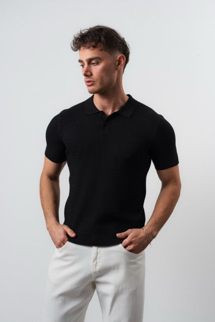 Polo à boutons noir pour homme de marque NO LIMIT avec manches courtes, porté sur un mannequin.