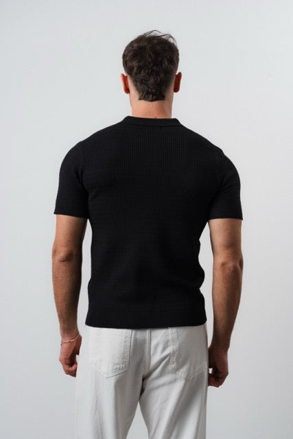 Polo à boutons noir pour homme de la marque NO LIMIT, manches courtes, vue de face.