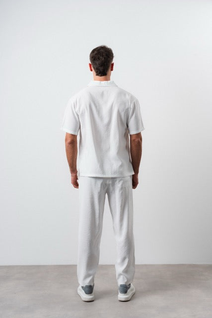 Ensemble Ibiza blanc de la marque NO LIMIT, vêtement élégant pour femmes, conçu en tissu léger avec détails modernes.