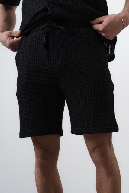 Ensemble maille gaufrée noir NO LIMIT, vêtements élégants en tissu côtelé, vue de l'ensemble sur mannequin.