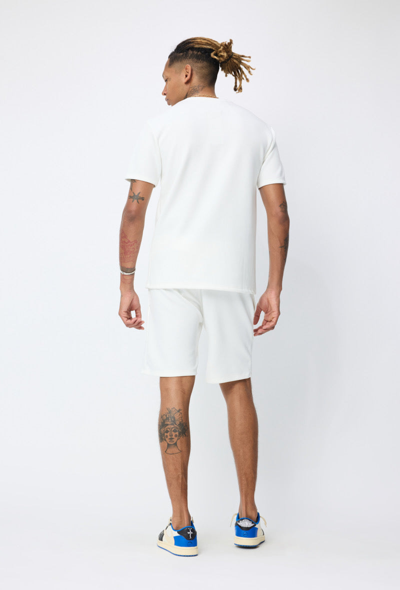Ensemble basic blanc de la marque NO LIMIT, vêtement simple et confortable, visible en image.