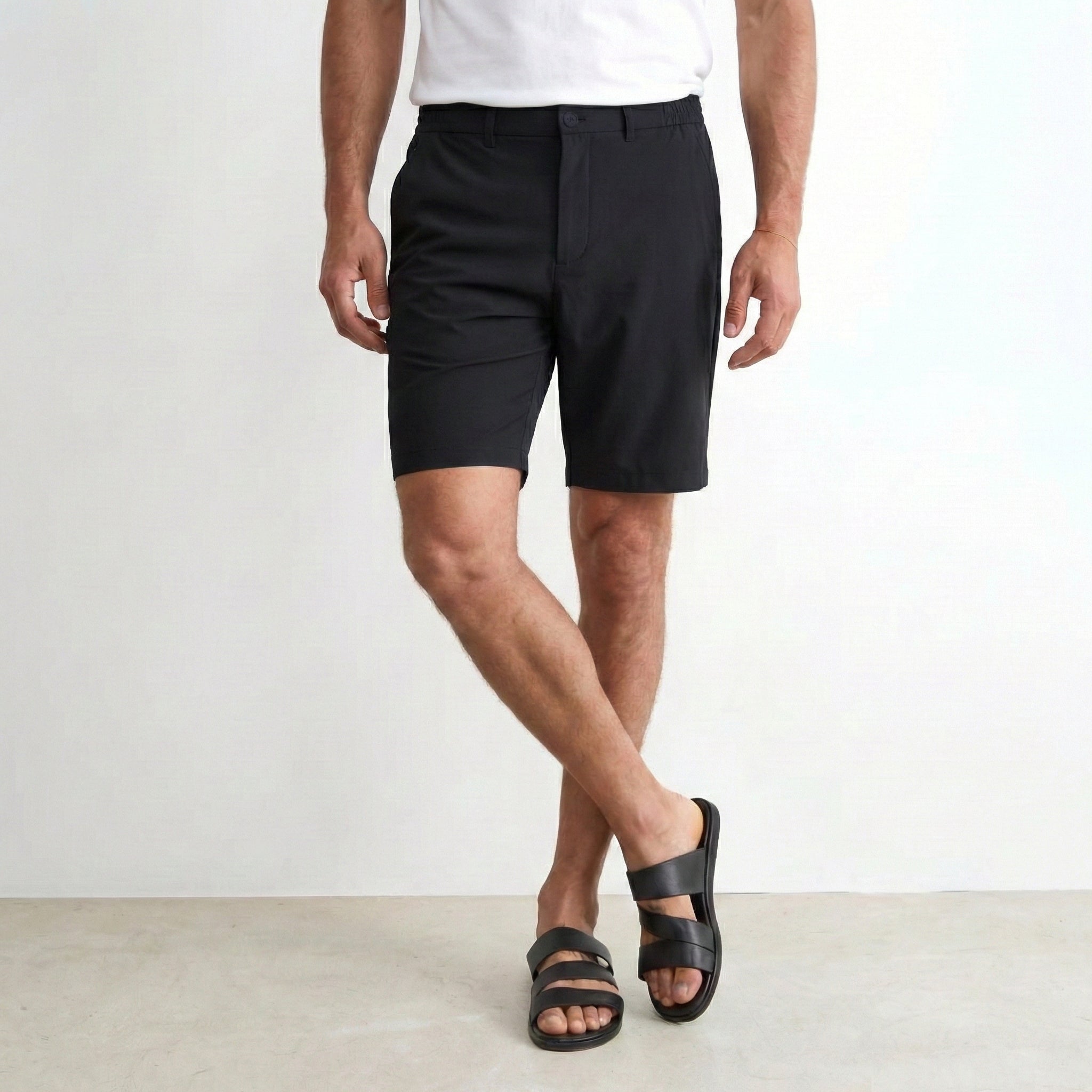 Shorts premium TECH noir NO LIMIT, tissu noir avec détails modernes, ajustés et confortables, visibles sur cette image.