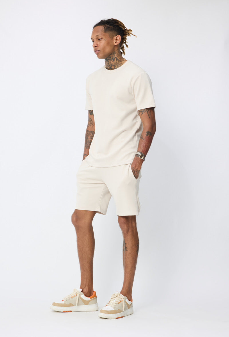 Ensemble basic beige NO LIMIT, vêtements assortis pour homme ou femme, vue de l'ensemble sur fond neutre.