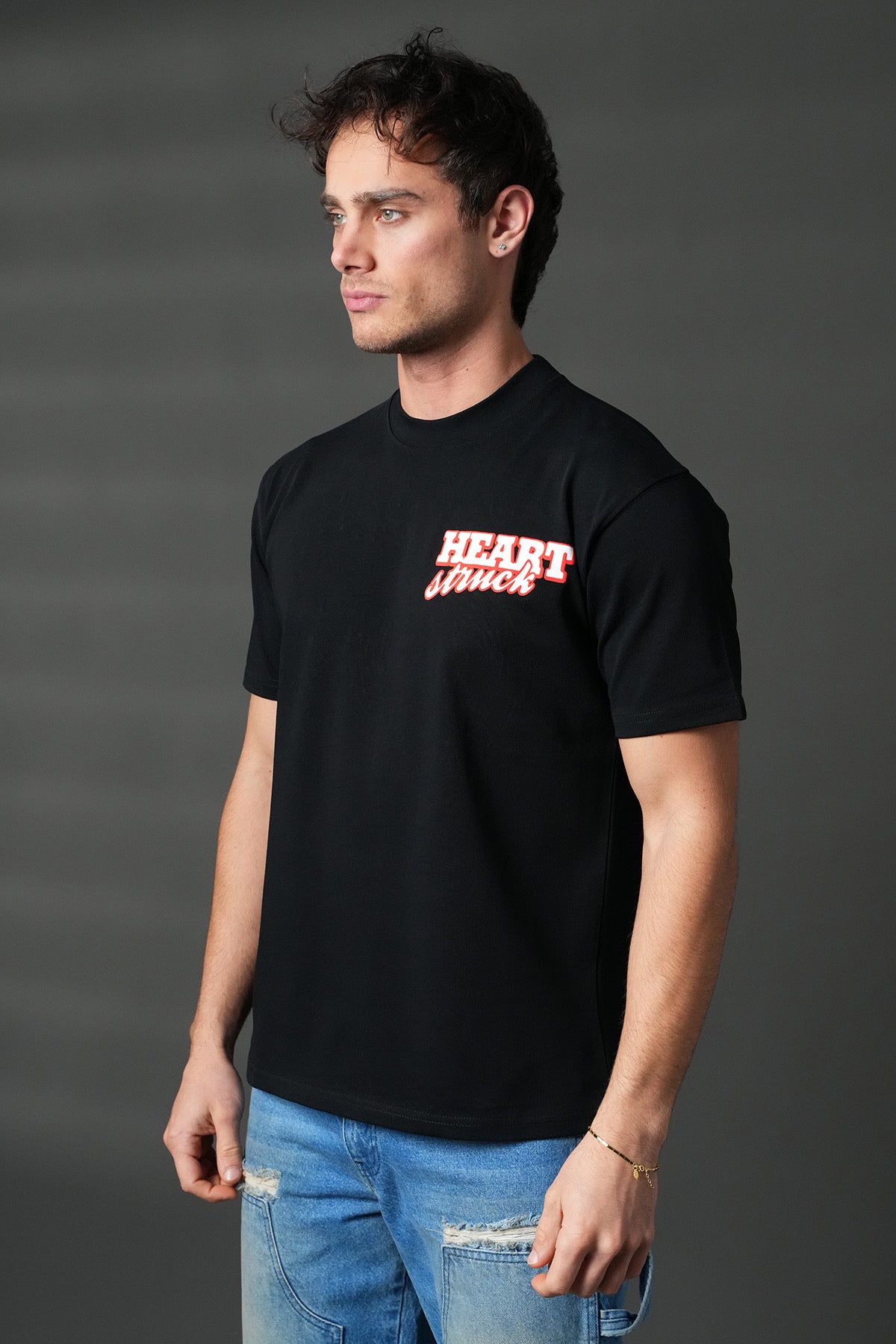 T-shirt noir avec motif cœur de la marque NO LIMIT, vu de face, en coton confortable, pour un style décontracté.