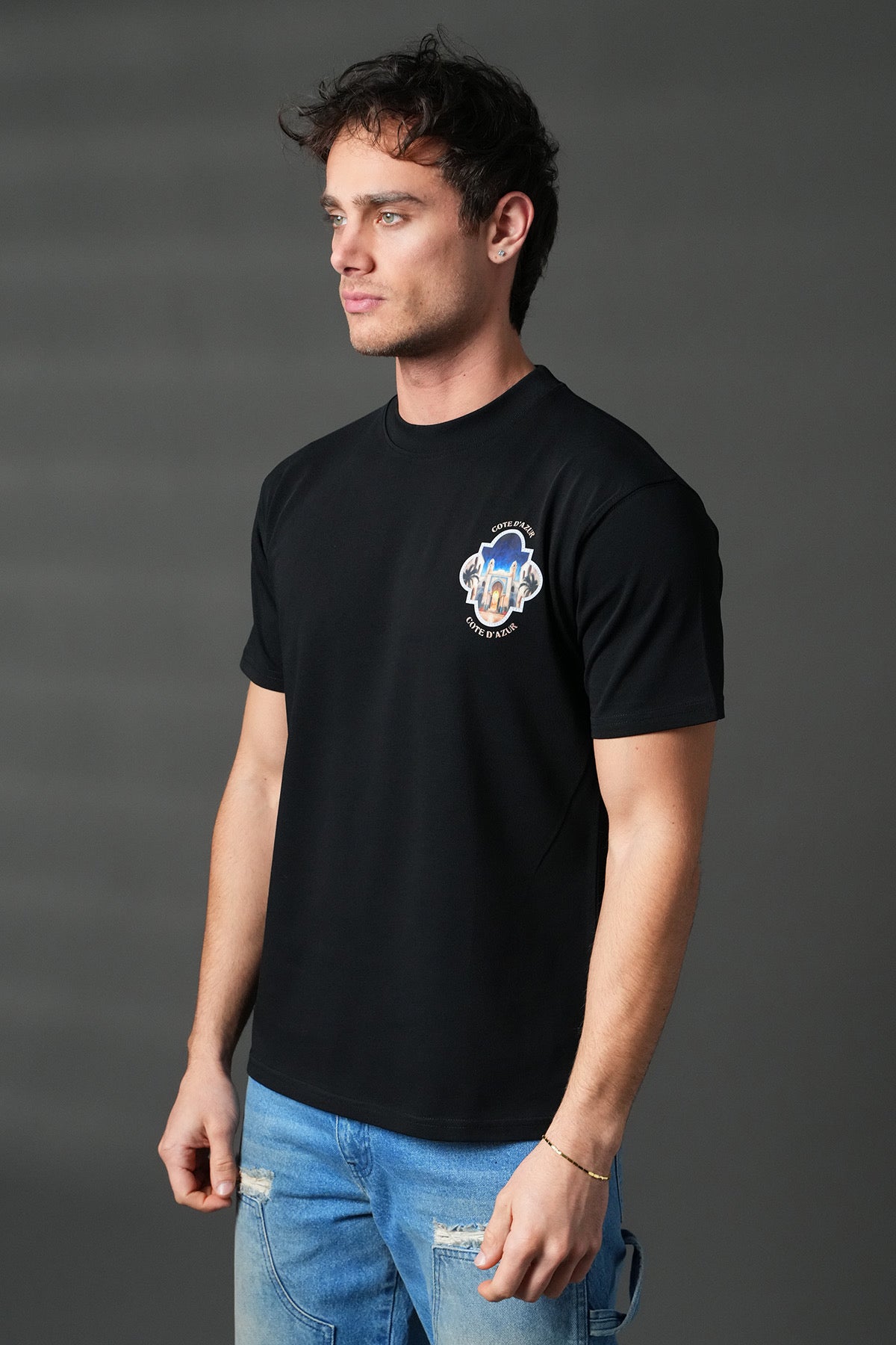 T-shirt noir NO LIMIT avec motif Côte d'Azur, coton confortable, vue frontale sur design coloré, mode décontractée et élégante.