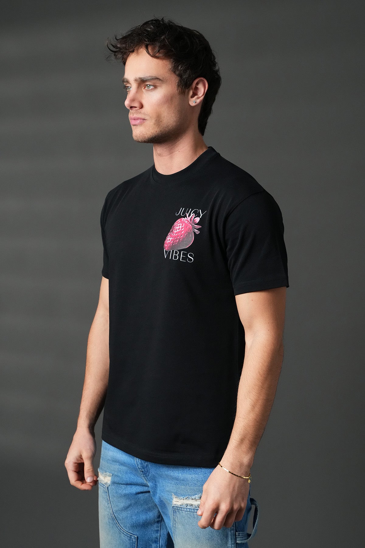 T-shirt noir Juicy de la marque NO LIMIT, vue de face, en coton avec logo coloré sur la poitrine.