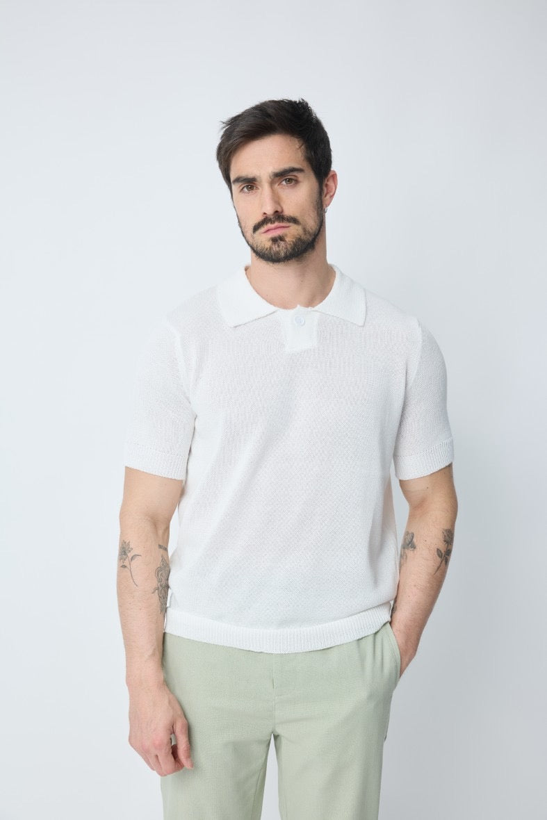 Polo blanc texturé à boutons NO LIMIT à manches courtes, vue de face sur fond neutre.