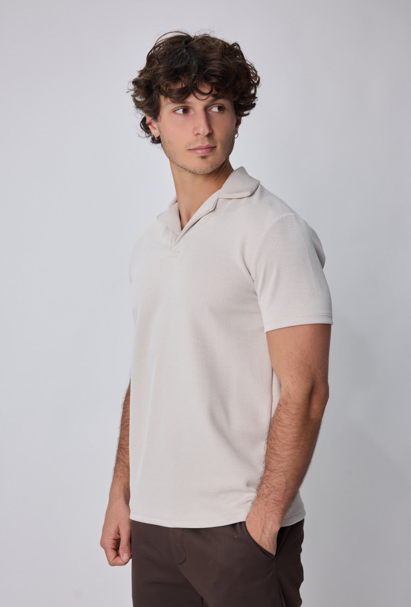 Polo côtelé beige à manches courtes de la marque NO LIMIT, vue de face sur fond neutre.