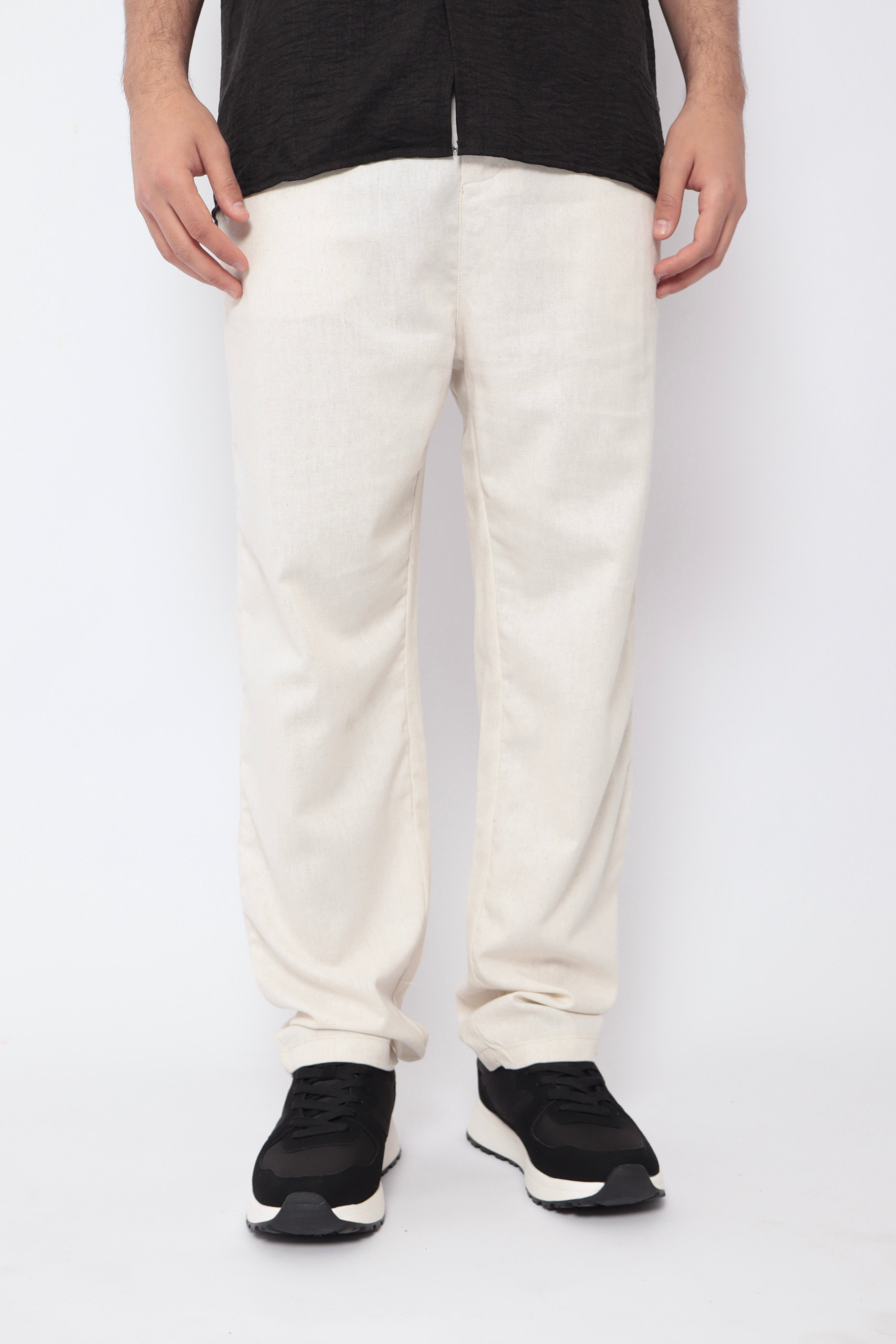Pantalon beige effet lin NO LIMIT porté, vue de face, en tissu léger et décontracté pour un style estival.