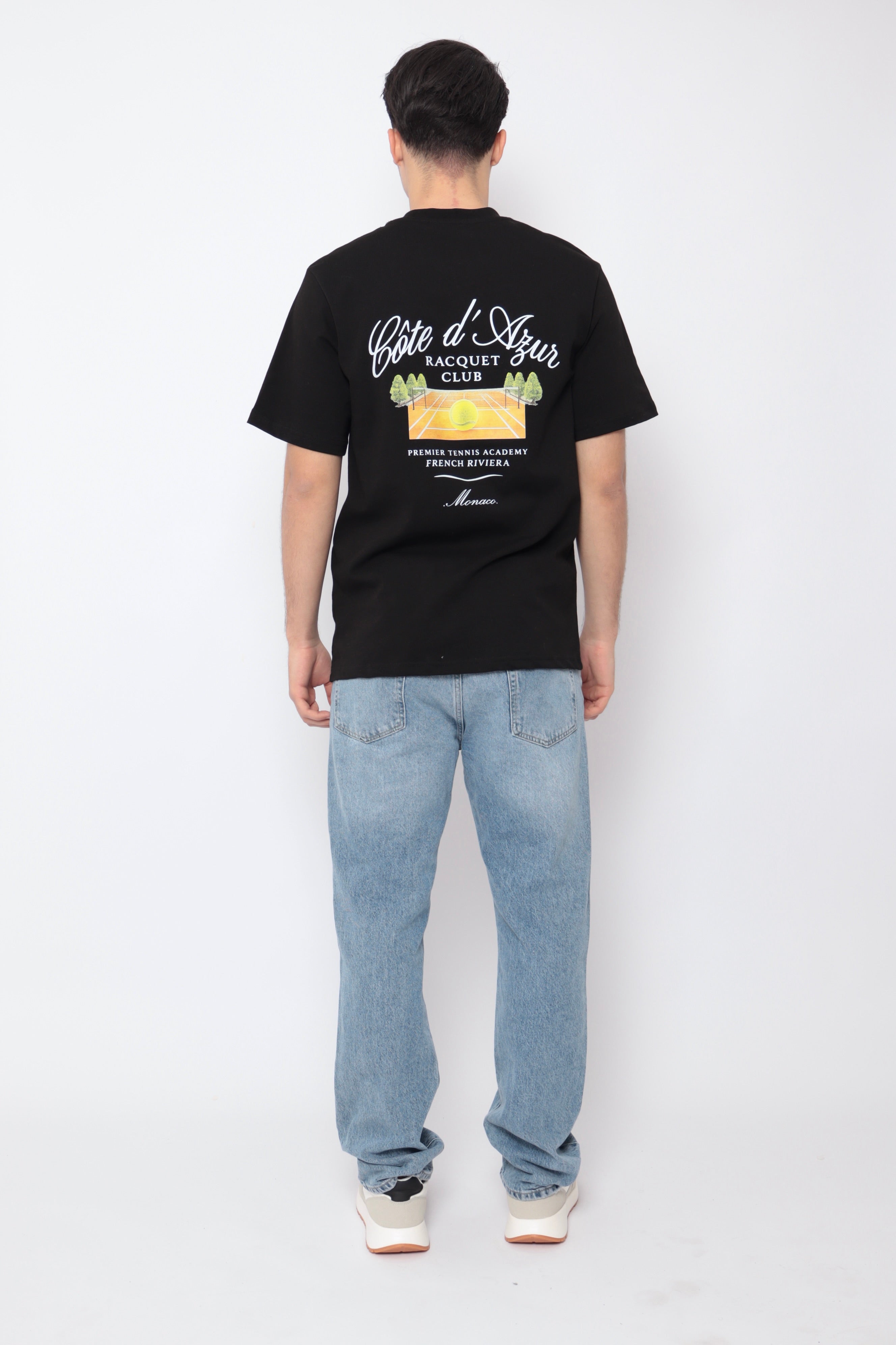 T-shirt noir NO LIMIT French Riviera porté, en coton avec logo imprimé sur la poitrine, style décontracté et élégant.