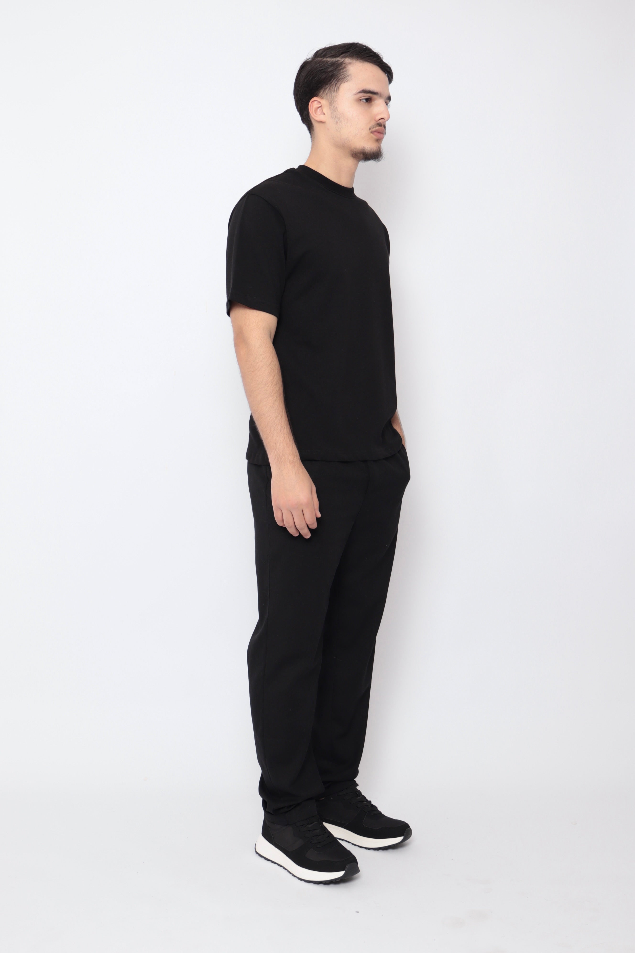 Pantalon noir effet lin NO LIMIT, coupe décontractée, tissu léger et fluide visible sur l'image.