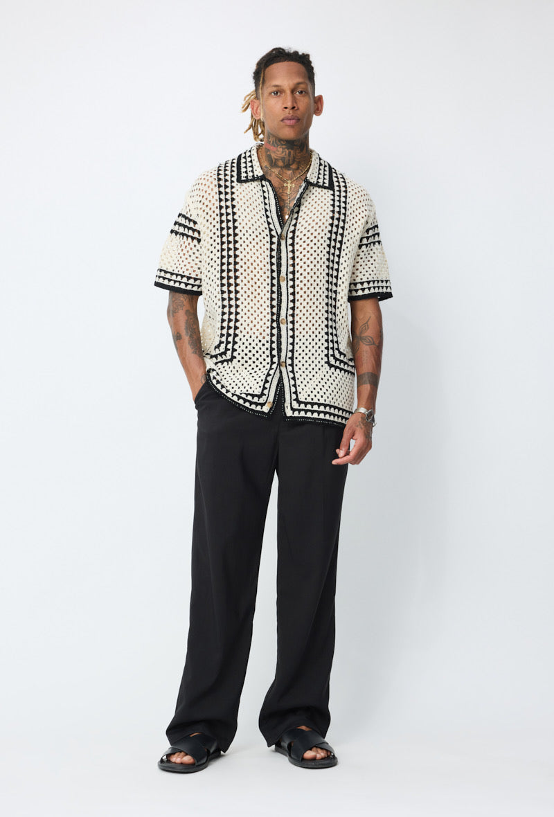 Chemise ajourée beige de style carré de la marque NO LIMIT, détails en tissu léger et transparent.