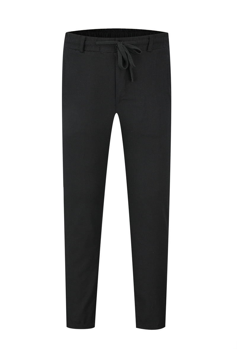 Pantalon noir effet lin NO LIMIT, style décontracté avec ceinture et poches visibles, tissu léger et confortable.