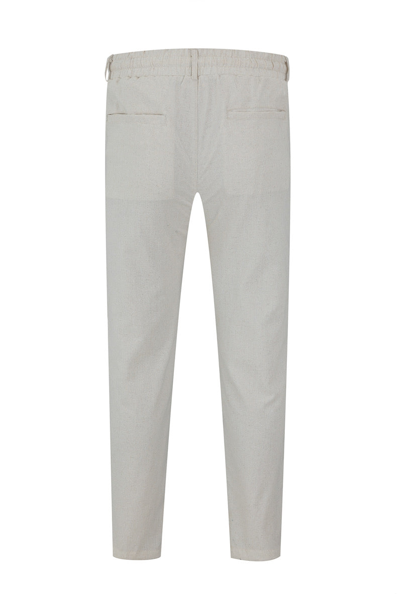 Pantalon effet lin beige de la marque NO LIMIT, vue de face, avec coupe décontractée et détails de la texture en tissu naturel.