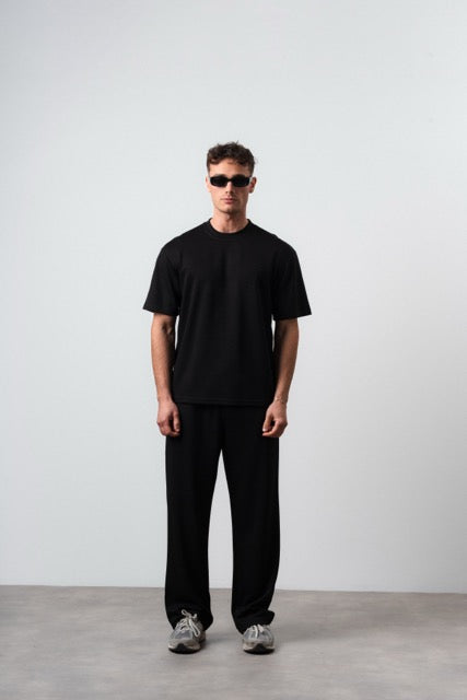 Ensemble lyon noir de la marque NO LIMIT, vêtement pour homme, vue de l'ensemble porté, détail de la coupe et du tissu.