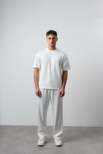 Ensemble lyon blanc de la marque NO LIMIT, vêtement pour homme, vue de l'ensemble posé sur un fond neutre.