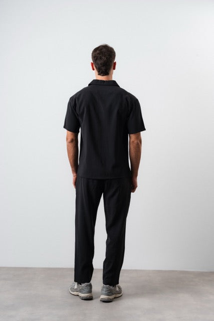Ensemble Ibiza noir de la marque NO LIMIT, vue de face, avec coupe élégante et détails modernes.