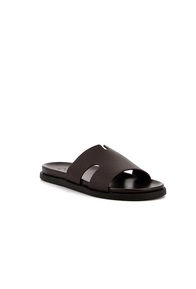 Sandales en cuir marron de la marque NO LIMIT, chaussures de style baskets visibles sur l'image.